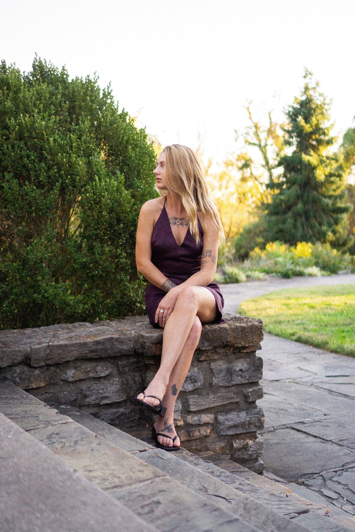 The Josephine, seated on the stone wall