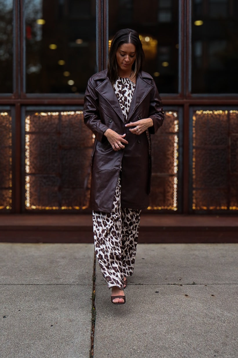 Espresso trench over the Animal Drape set, at the iron window