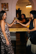 A champagne toast at the bar, The Regal Lane Gift Card