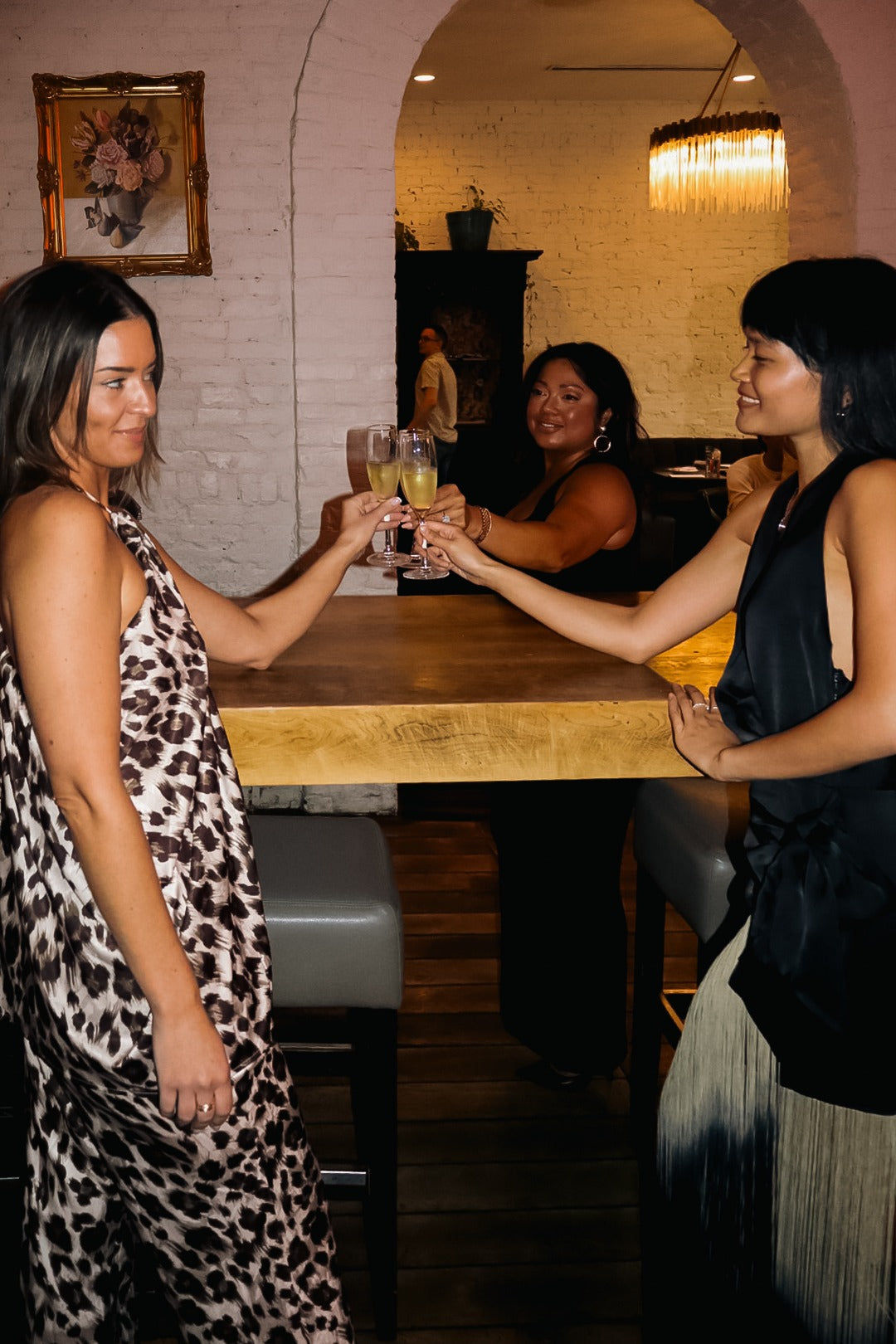 A champagne toast at the bar, The Regal Lane Gift Card
