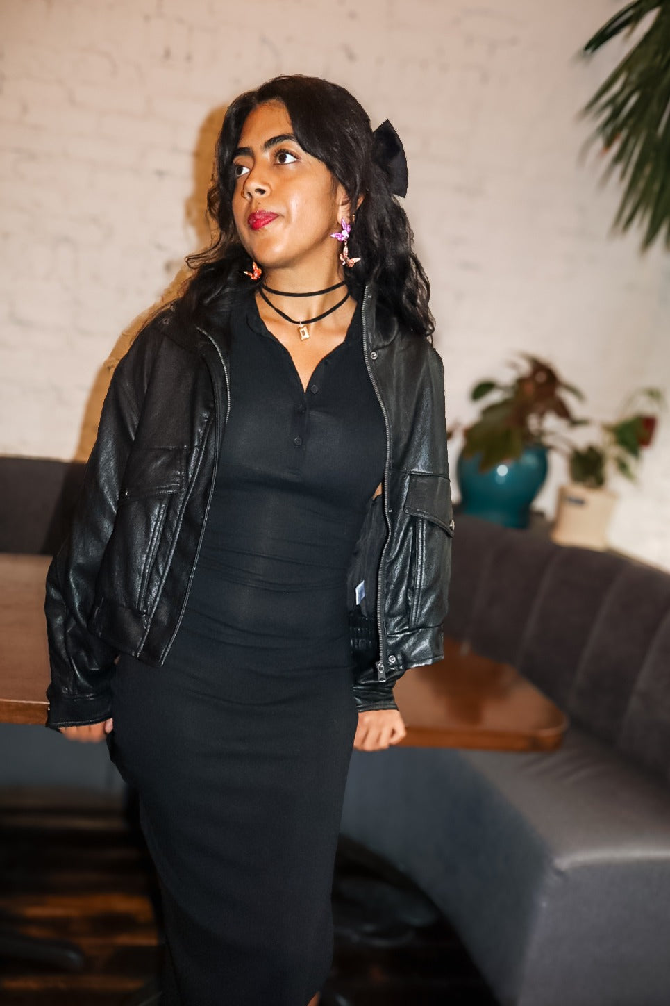 Black jersey maxi styled with the faux leather bomber